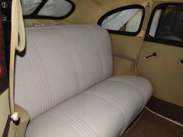 Brown leather car back seat upholstery